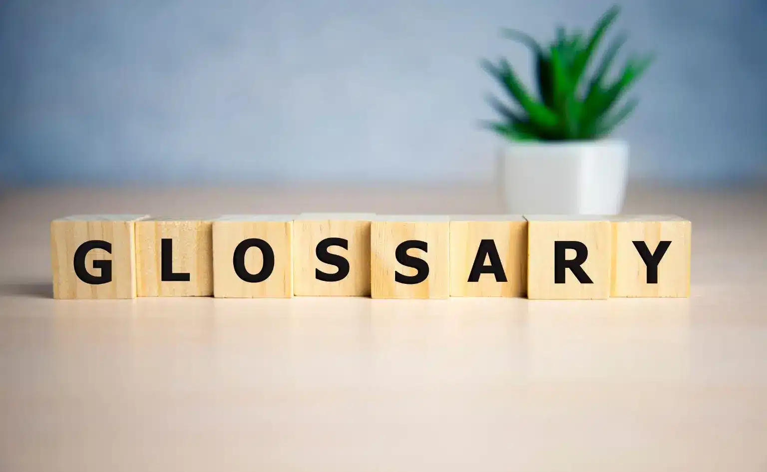 Fichas con letras indicando "glossary" en relación al glosario de términos técnicos sobre la IA